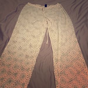 Lace bathing suit cover pants.